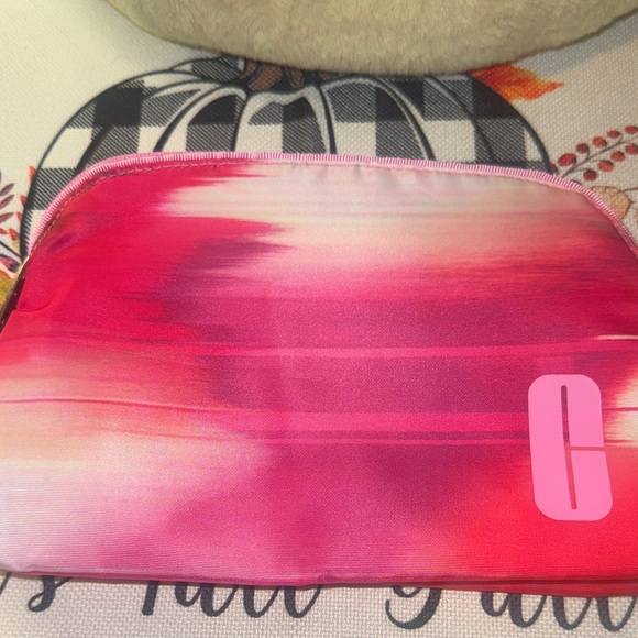 Clinique Handbags - Clinique Gradient Pink Cosmetic Bag